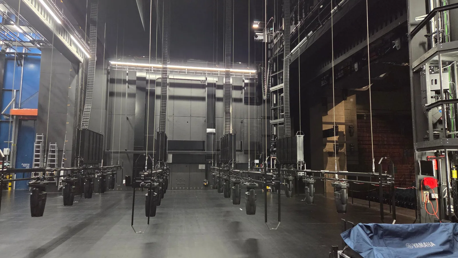 The stage of Theater Winterthur with the hanging cable carriers